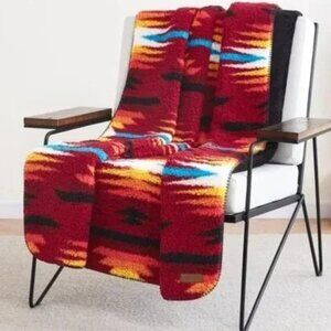 Snuggle up with the Sherpa Fleece Throw by Pendleton